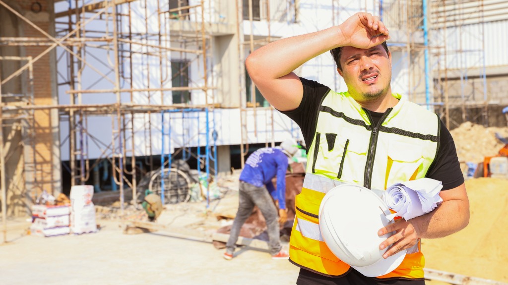 Man on a construction in the heat