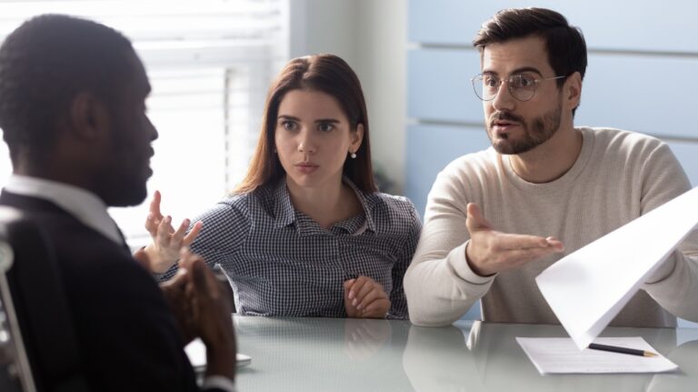 Man arguing over what's on a piece of paper
