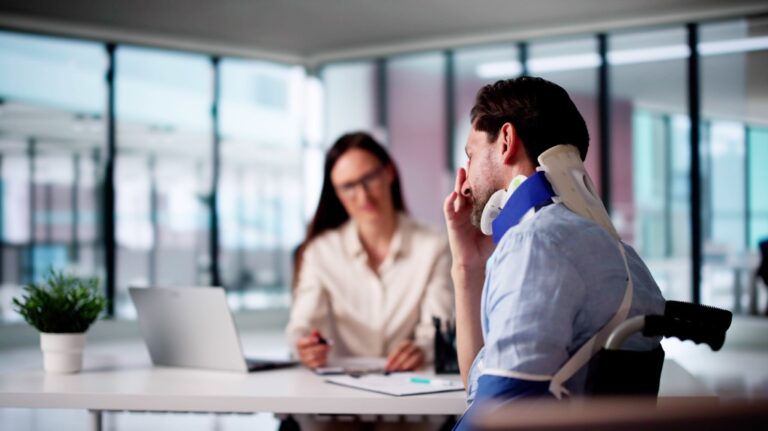 Injured man explaining to a lawyer