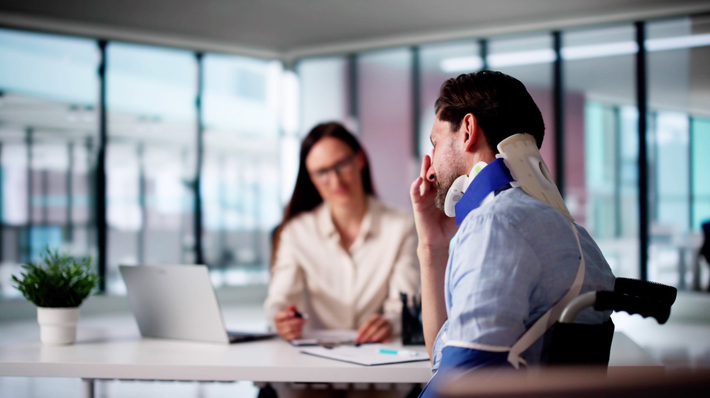 Injured man explaining to a lawyer