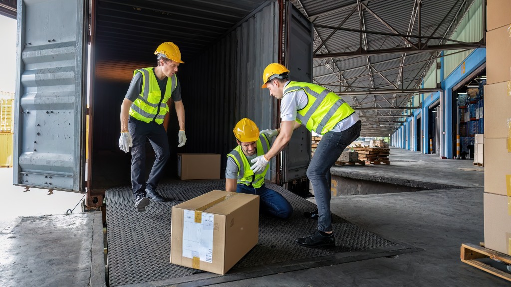 Worker carry carton box got accident drop box to floor injury
