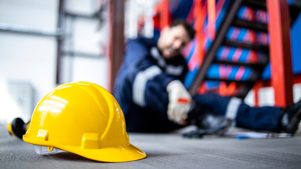 hardhat and injured factory worker