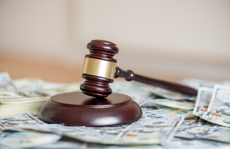 judge's gavel and money